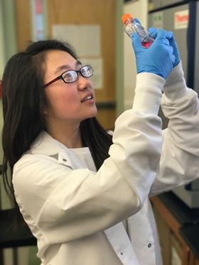 Jiwoo Lee, AMST 2017, in a lab during her experimentation.
