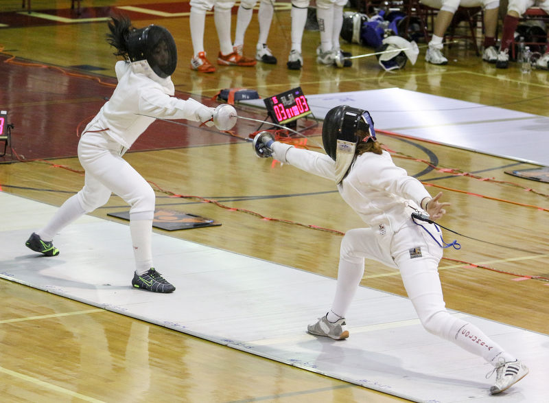 Bergen Technical High School's Isabella Impalli (left) vs. Columbia High School's Isabelle Wendt during the girls fencing final at Morris Hills High School in Rockaway