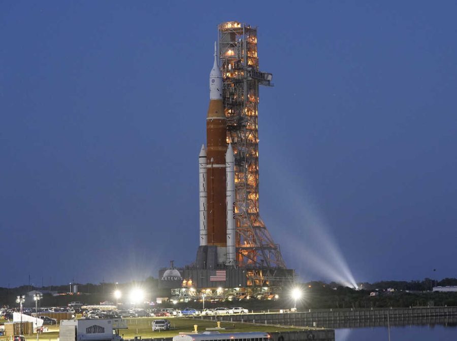 The NASA Artemis rocket with the Orion spacecraft aboard leaves the Vehicle Assembly Building moving slowly on an 11 hour journey to pad 39B at the Kennedy Space Center in Cape Canaveral, Fla., Thursday, March 17, 2022. While at the pad the rocket and Orion spacecraft will undergo tests to verify systems and practice countdown procedures. (AP Photo/John Raoux)