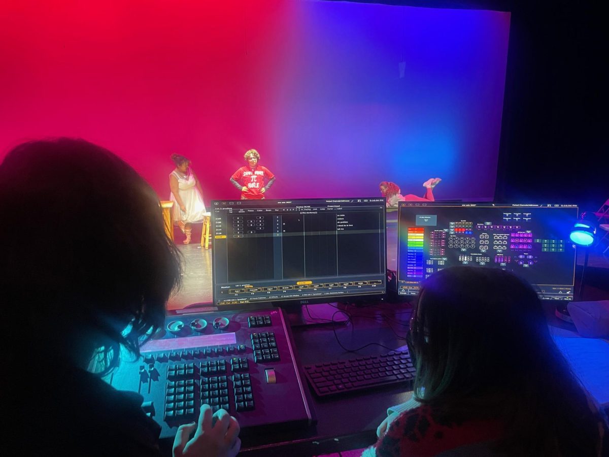 Students programming the lights for one-acts in late May of 2023.
